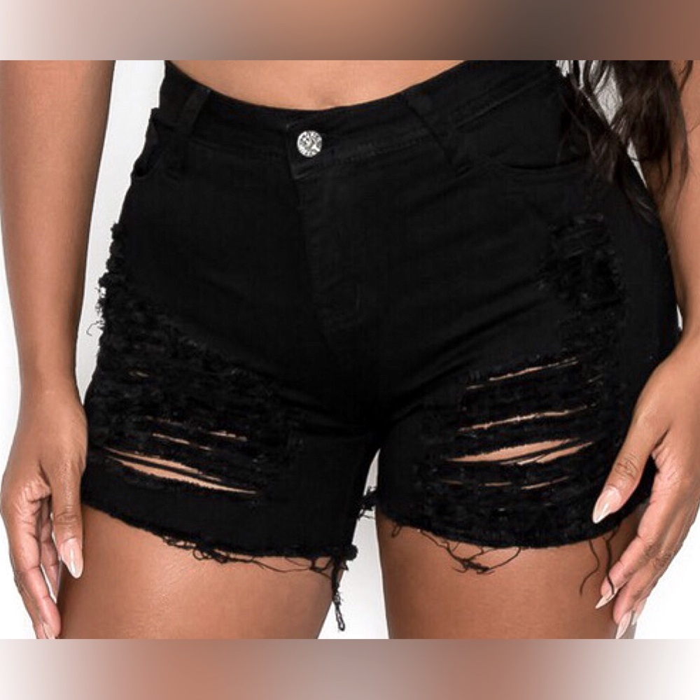 Stretch black ripped Jean shorts.